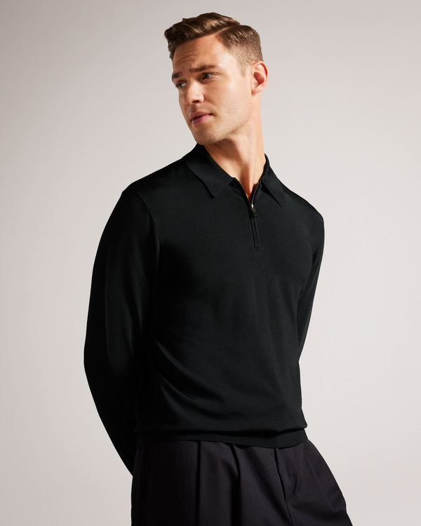 VIBA-Knitwear-Our classic VIBA shirt is nothing short of impeccable. Featuring a comfortable knit and modern half zip closure, it pairs well with everything from jeans to chinos.The fabric of this product is made of 100% recycled viscose. Using recycled materials helps divert fabric waste from ending in landfills and reduces our dependence on virgin materials. Polo shirt Long sleeved Half zip placket Classic collar Knitted rayon Tobias is 6'1" / 1.86m and wears Black in a Ted size 3- Ted Baker Romania